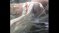 gay couple fucking bareback in water