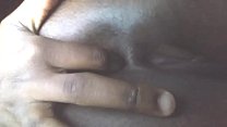 Jamaican ebony fingers her ass