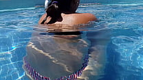 Buttocks in thong come out of the pool 2