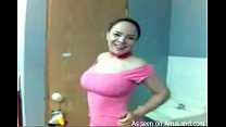 Busty Latina in pink strips in the bathroom