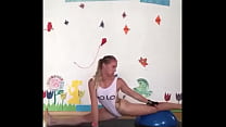 BLONDE DOING GYMNASTICS IN THE ACADEMY