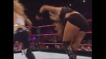 Mickie James faces Maria while dressed as Trish Stratus. Raw 2006.