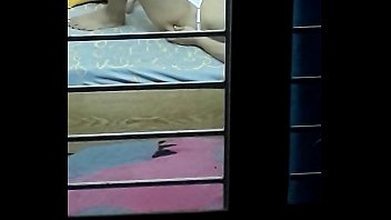 The neighbor's sister is lying in bed waiting for her to fuck