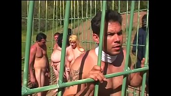 Young redhead wirth small tits Flick Shagwell and a dude fuck in a cage outdoors on the planet of monkeys