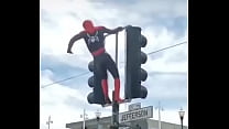 SPIDER MAN SWINGING YUMMY ON THE SIGN