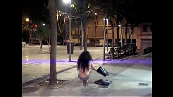The transvestite Maria Lizana strips naked on the street