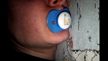 He sucks his pacifier like a cock  while s.
