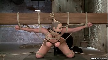 Tied for big tits slave is caned