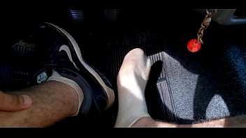 Typing in sneakers, socks and rest