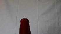 analstretching with a fat red dildo