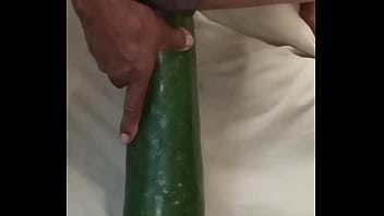 Devouring this thick and long cucumber