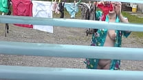 Milf naked in public. Voyeur. Frinas husband peeps in window like in house yard her pregnant sister dries clothes in bathrobe no bra and panties. Public nudity. Outdoors POV