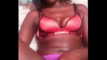 African girl plays with her long pussy lips