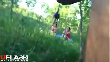 The guy crazily jerks off on two girls in the forest