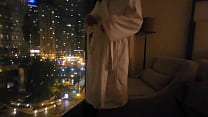 masturbating in public in front of hotel window